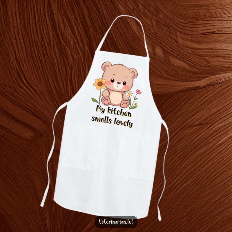 Funny bear apron, a curious bear sniffing a flower with a gentle expression, ideal for kitchen use.