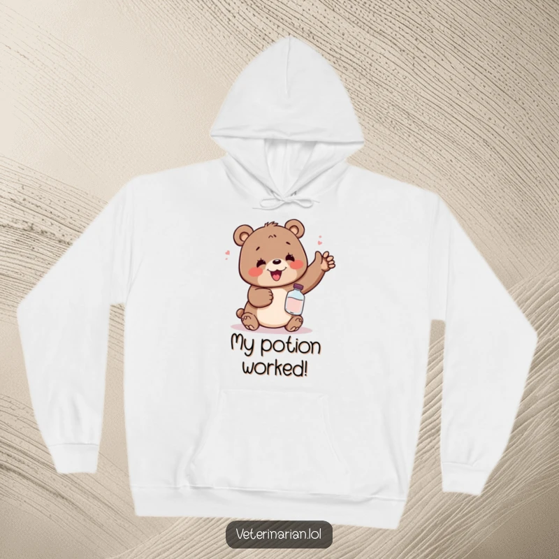 Funny hoodie with a delighted bear looking immensely relieved while clutching a small potion bottle, embodying pure comfort and humor.